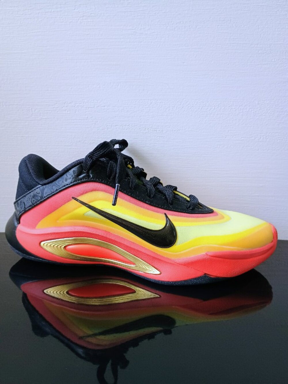 Nike Women's A'One ASW A'ja Wilson Sneaker in Awesome Black Metallic / Gold